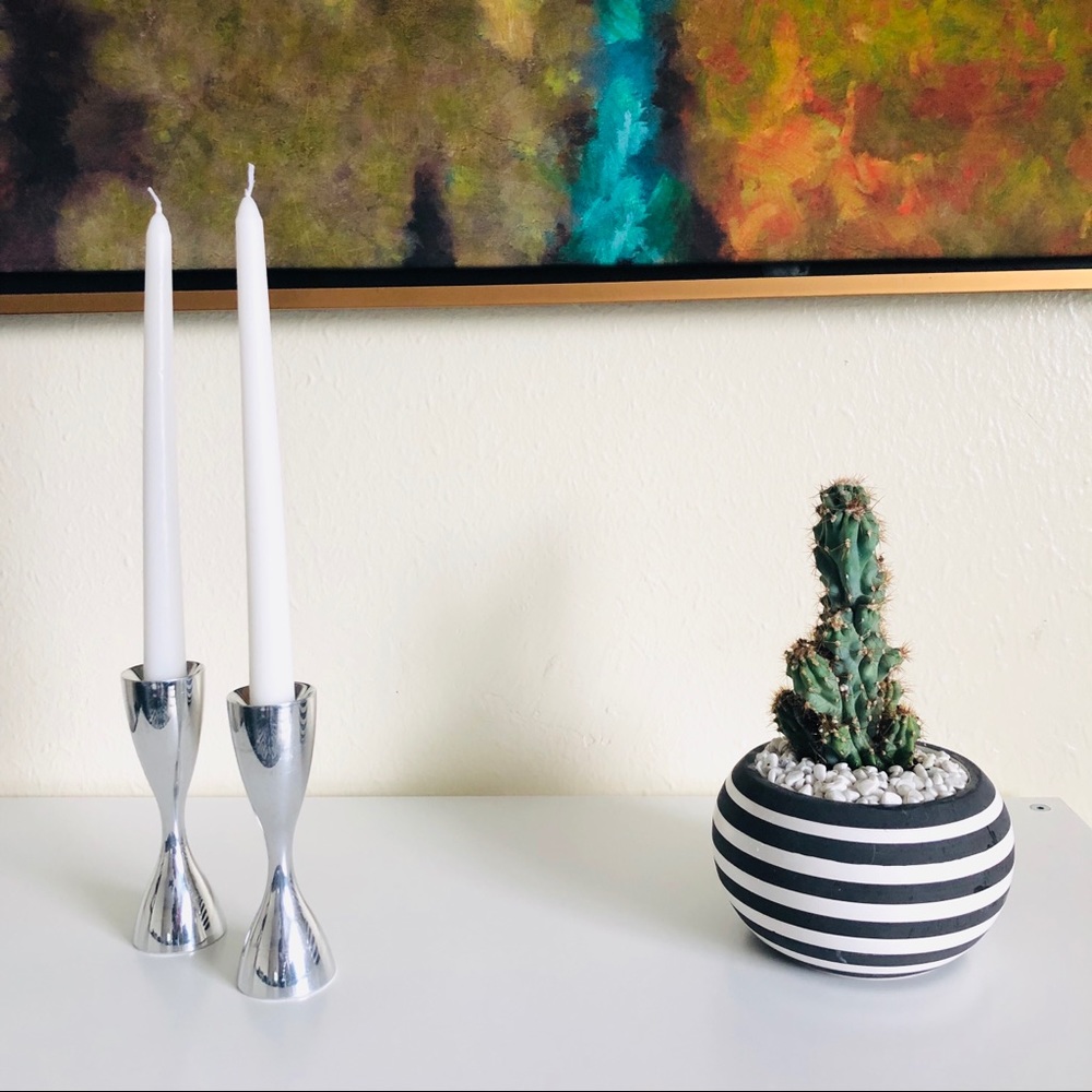Nambé Studio flare candlesticks by Karim Rashid